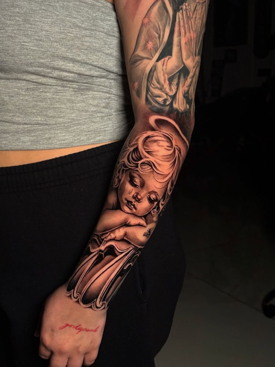 Cherub sleeve with praying hands and red 'godspeed' hand script